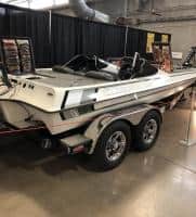 Boat fully outfitted with Easy View Tackle System displayed at a fishing tackle show